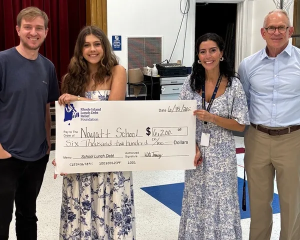 Rhode Island Lunch Debt Relief Foundation presenting a $6,200 check to Nayatt School